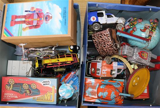 A collection of assorted tinplate toys